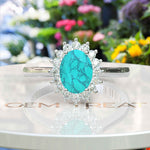 Load image into Gallery viewer, Natural Elegance: Luminous Oval Turquoise Ring Crowned with a Moissanite Halo
