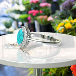 Load image into Gallery viewer, Natural Elegance: Luminous Oval Turquoise Ring Crowned with a Moissanite Halo
