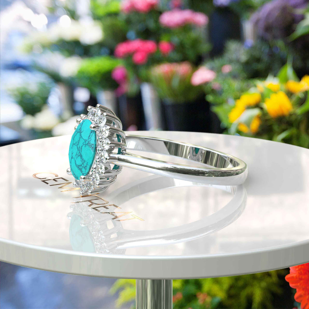 Natural Elegance: Luminous Oval Turquoise Ring Crowned with a Moissanite Halo