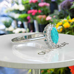 Load image into Gallery viewer, Natural Elegance: Luminous Oval Turquoise Ring Crowned with a Moissanite Halo
