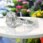 Load image into Gallery viewer, Modern Romance: 3.0ct Asscher Cut Engagement Ring Encircled by Gleaming Baguette Moissanites.
