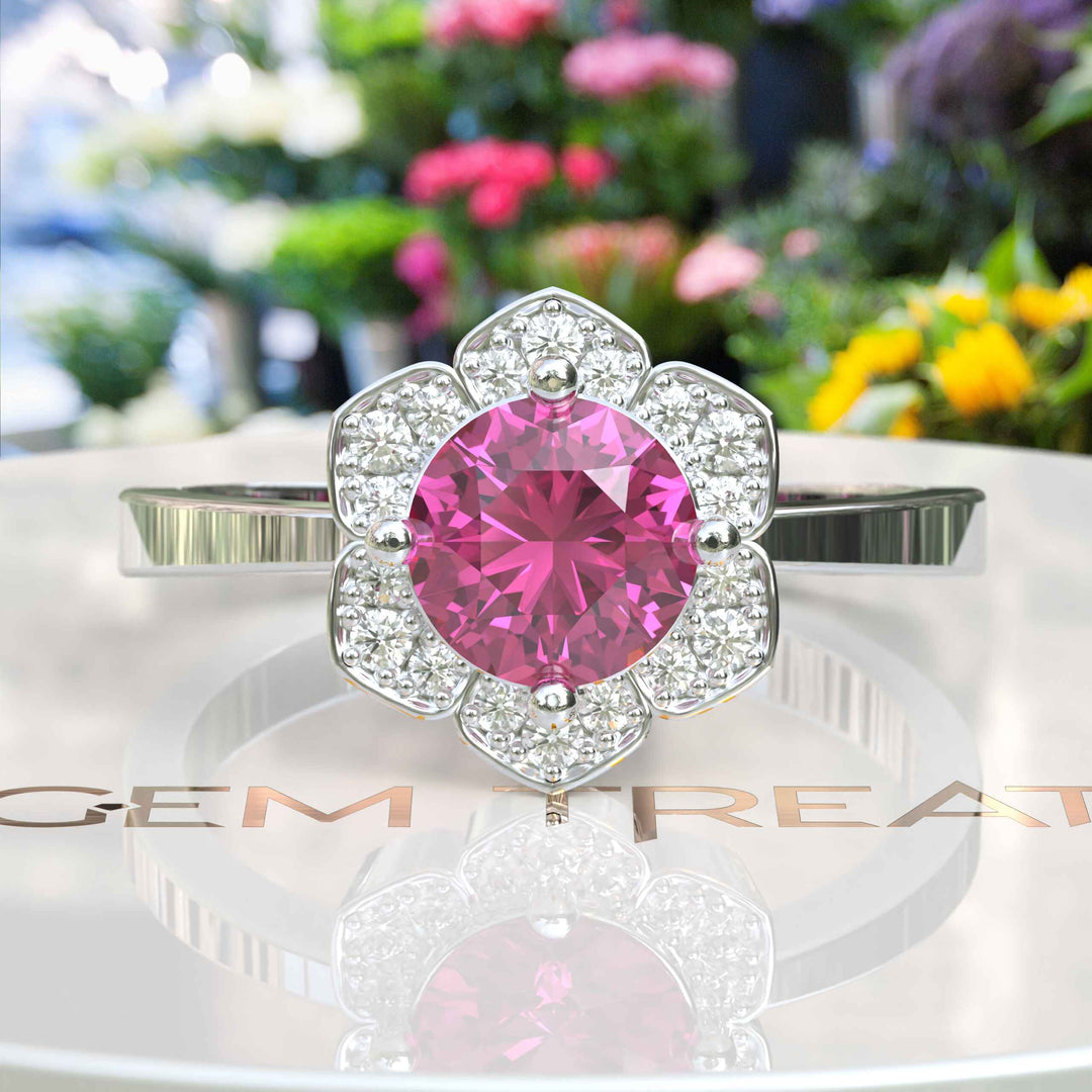 Blossoming Beauty: Round Pink Sapphire Ring in Floral Halo with Moissanite Sparkles.