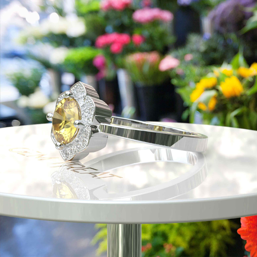 Blossoming Brilliance: Floral-Styled Round Yellow Sapphire Ring with Moissanite Halo.