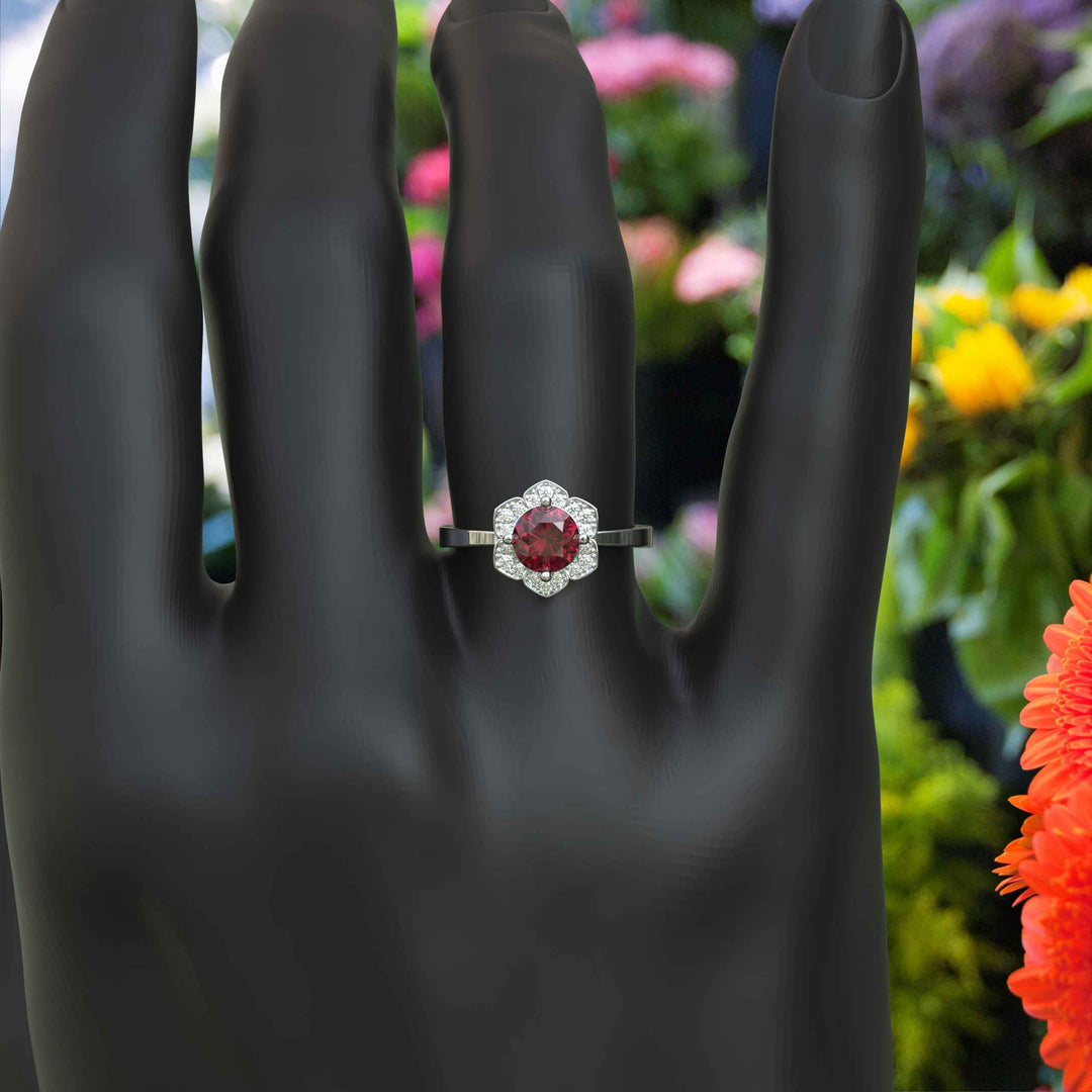 Blossoming Passion: Round Ruby Ring with Floral-Styled Halo