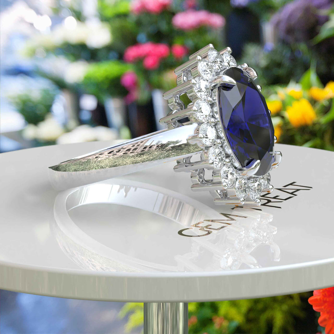 The Pinnacle of Romance: 4.0ct Oval Blue Sapphire Halo Ring Adorned with Moissanite Accents.