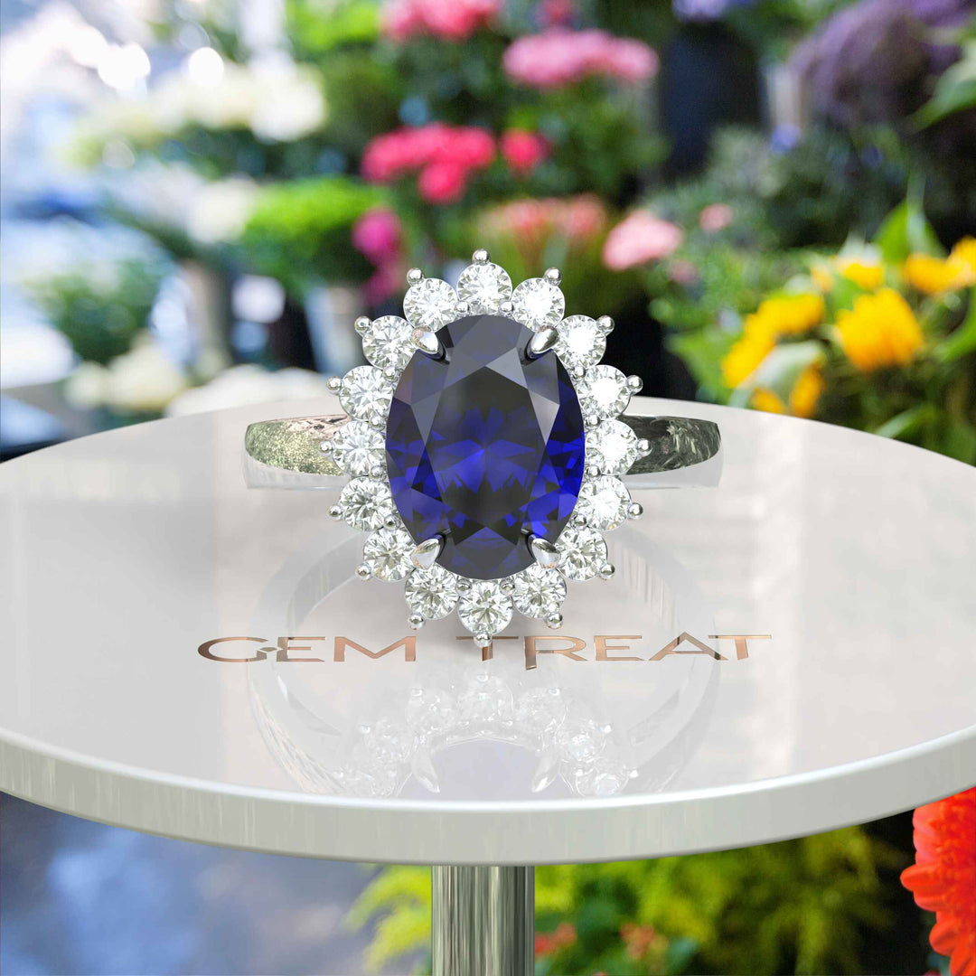 The Pinnacle of Romance: 4.0ct Oval Blue Sapphire Halo Ring Adorned with Moissanite Accents.