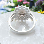 Load image into Gallery viewer, Elegant 4.0ct Oval Morganite Ring Surrounded by Glistening Moissanite Halo
