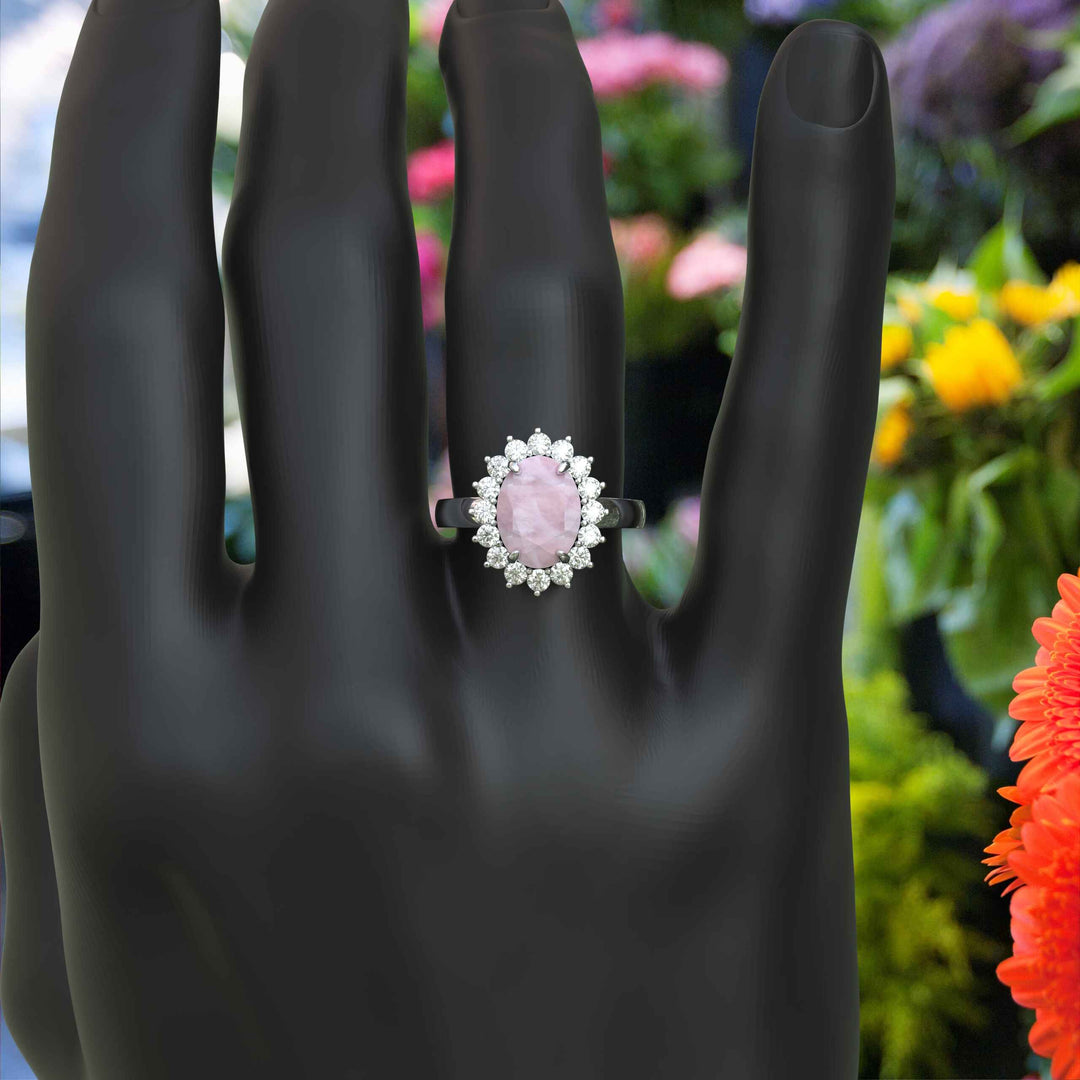 Ethereal Glow: 4.0ct Rose Quartz Oval Ring with Dazzling Moissanite Halo.