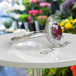 Load image into Gallery viewer, Regal Red: Glimmering 2.0ct Ruby Ring with Radiant Moissanite Halo.
