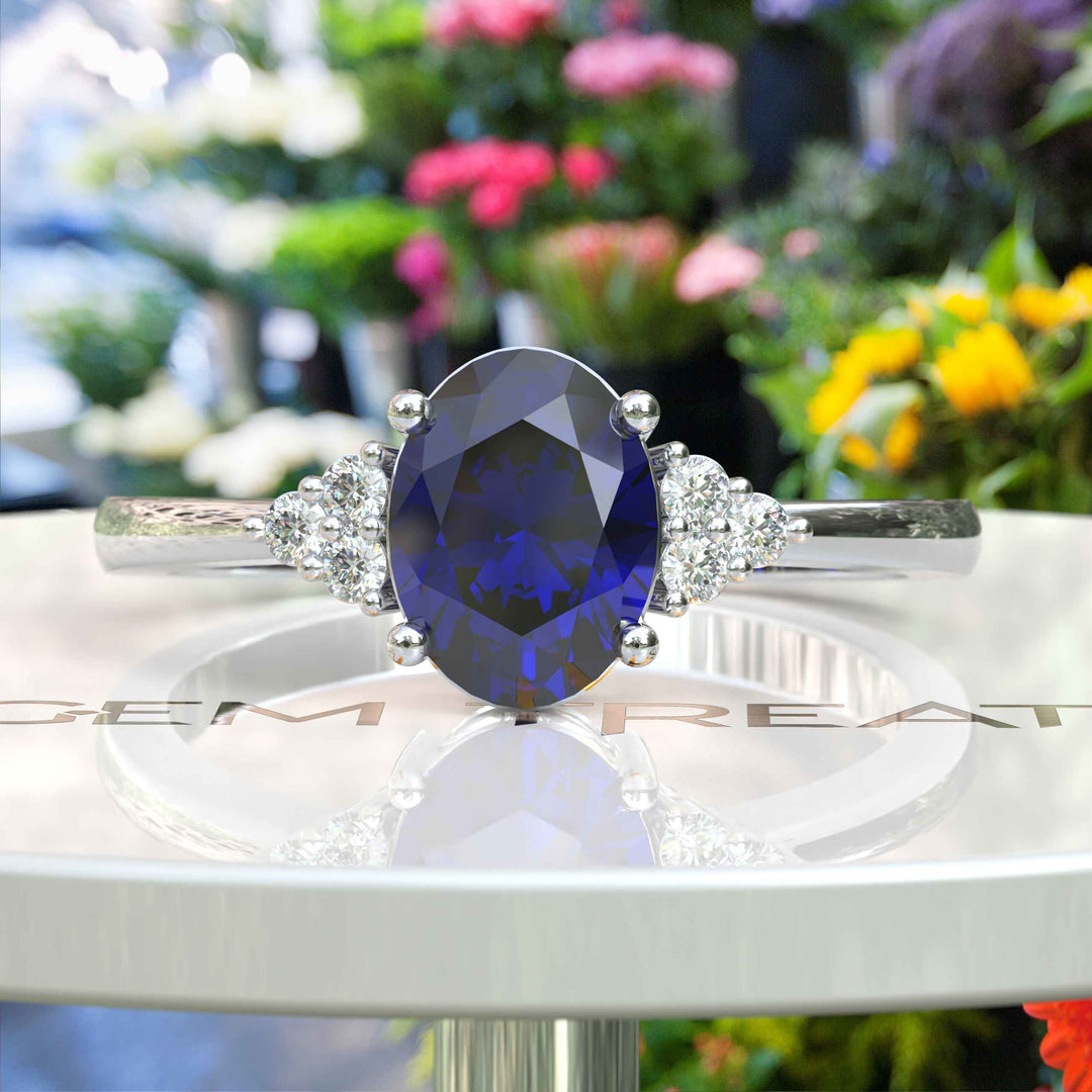 Twilight Dream: Stunning Oval Blue Sapphire Ring with Moissanite Companions.