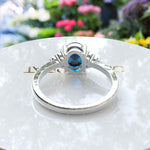 Load image into Gallery viewer, Captivating Oval London Blue Topaz and Moissanite Accent Gemstone Ring
