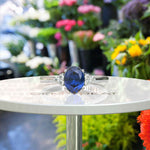 Load image into Gallery viewer, Captivating Oval London Blue Topaz and Moissanite Accent Gemstone Ring
