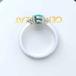 Load image into Gallery viewer, Mesmeric Blue: Oval Turquoise Ring with Brilliant Moissanite Companions.
