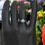 Load image into Gallery viewer, Classic Oval Opal Ring with Lustrous Moissanite Side Stones
