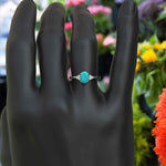 Load image into Gallery viewer, Mesmeric Blue: Oval Turquoise Ring with Brilliant Moissanite Companions.
