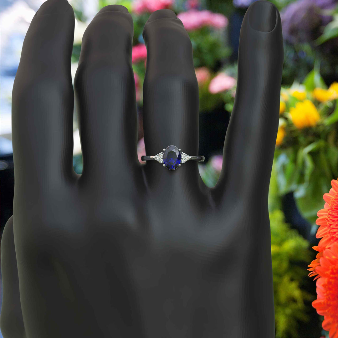 Twilight Dream: Stunning Oval Blue Sapphire Ring with Moissanite Companions.